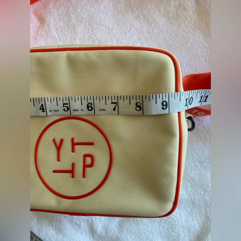 Youth‎ to the People Cream and Orange Messenger Bag